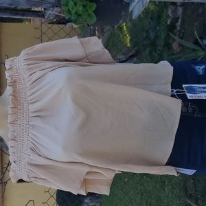 Light brown with half a sleeve